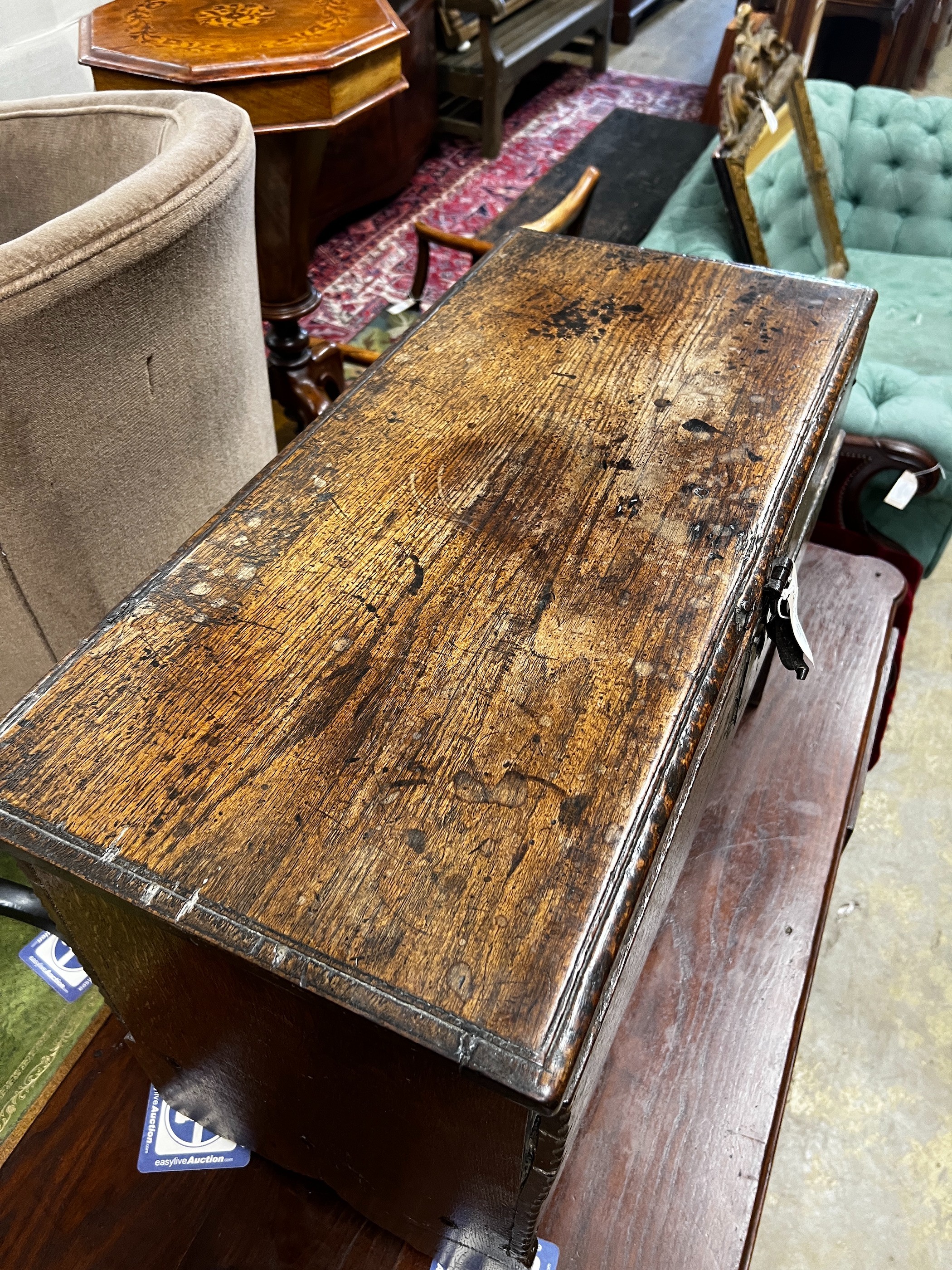 A late 17th century oak six plank coffer, length 73cm, depth 35cm, height 50cm